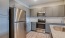 a kitchen with stainless steel appliances