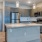 a kitchen with a marble island