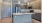 a kitchen with a marble island