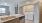 a kitchen with marble counters