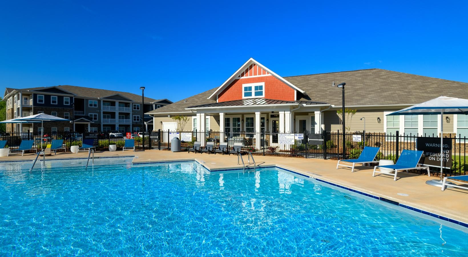 Sparkling swimming pool a swimming pool in front of a house