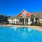 a swimming pool in front of a house