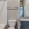 a bathroom with a tub sink and toilet