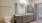 a bathroom with a large mirror