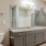 a bathroom with a large mirror