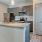 a kitchen with a marble island
