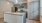 a kitchen with a marble island