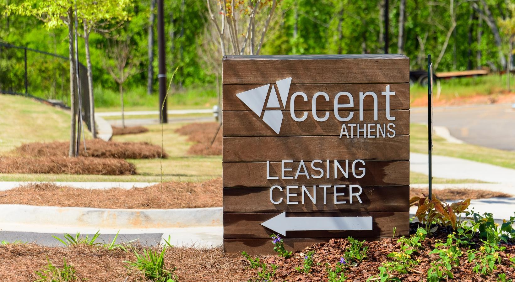 Find your perfect fit at Ascent Athens a sign on the side of a road